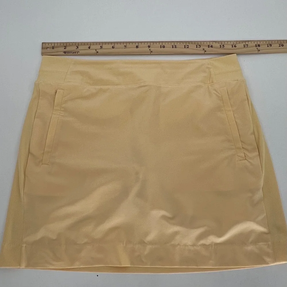 Athleta Women Brooklyn Athletic Skort Size‎ 10 Pale Yellow Golf Tennis Pockets